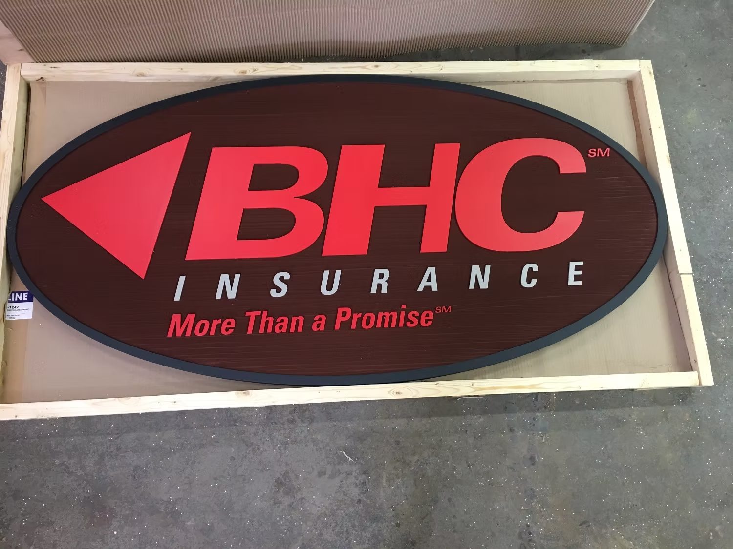 BHC Insurance Black Red Logo Sign