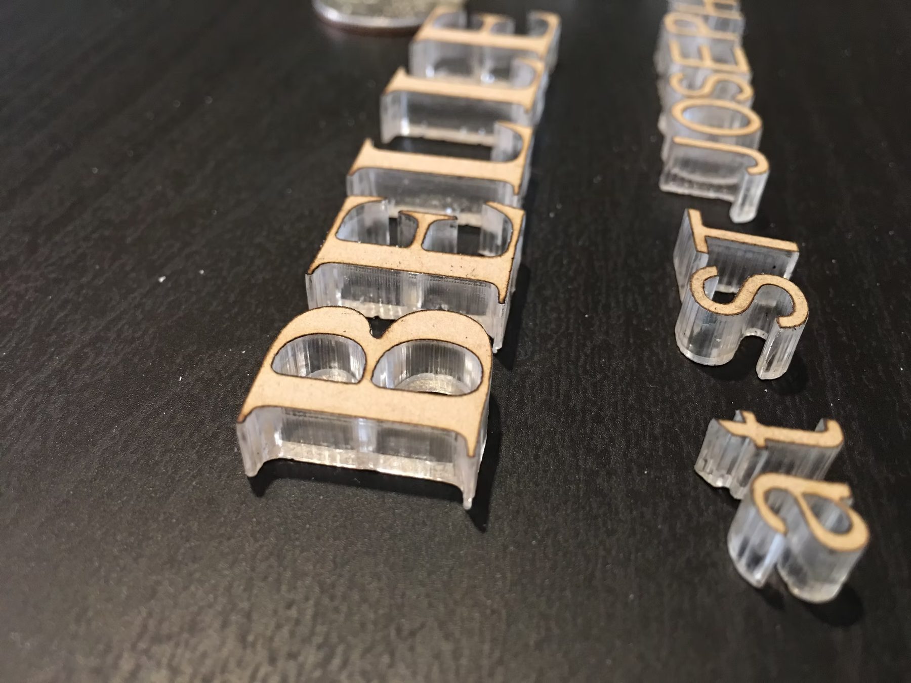Laser-cut acrylic dimensional letters and sign components