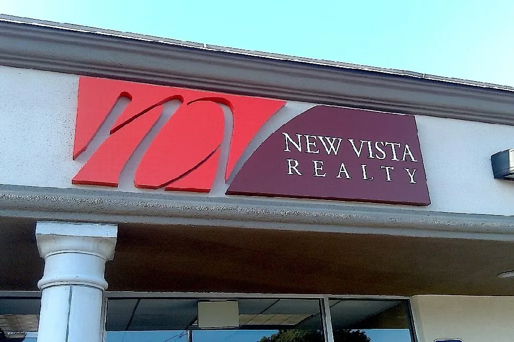 New Vista Realty Exterior Building Logo Letters