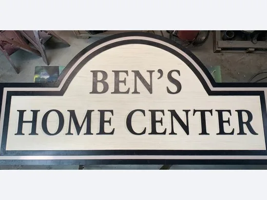 Ben's Home Center black and white dimensional business sign with arched top