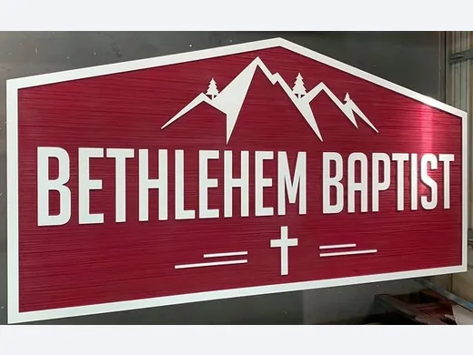 Bethlehem Baptist red and white dimensional church sign with mountain and cross graphics