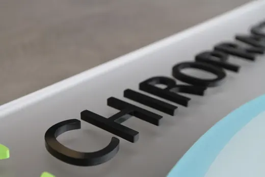 Black dimensional chiropractic sign letters
