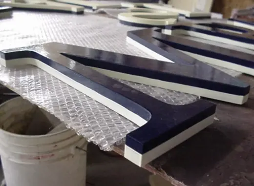 Dimensional sign letters during shop fabrication