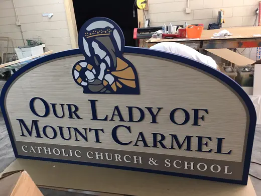 Our Lady of Mount Carmel church and school sign