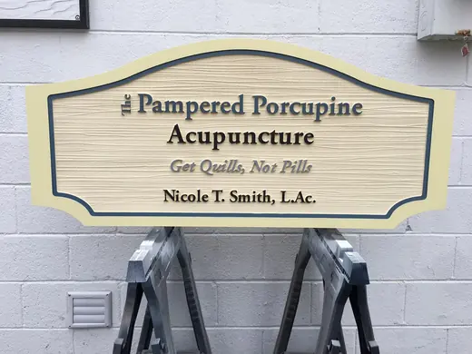 Pampered Porcupine Acupuncture routed business sign