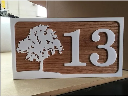 Custom residential address sign with woodgrain panel, layered oak tree and raised number 13