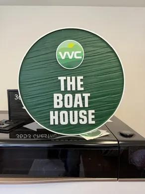VVC Boat House round directional sign